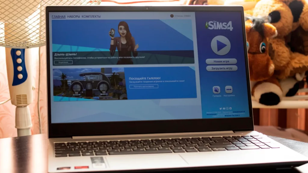 The Sims 4 game on a laptop