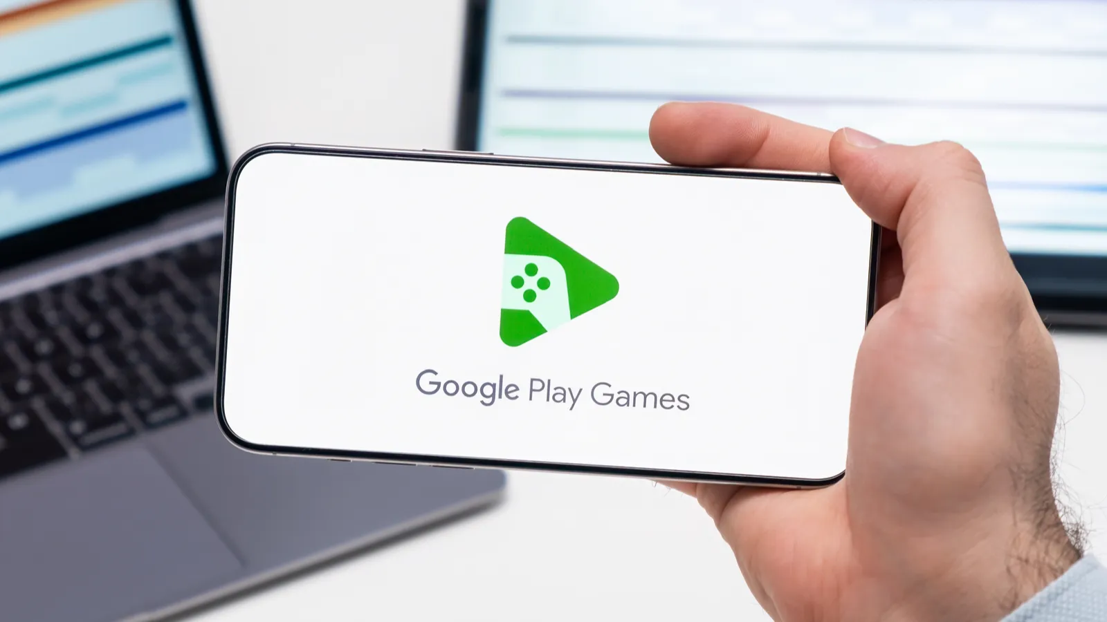 Google play games logo on the screen of a smartphone