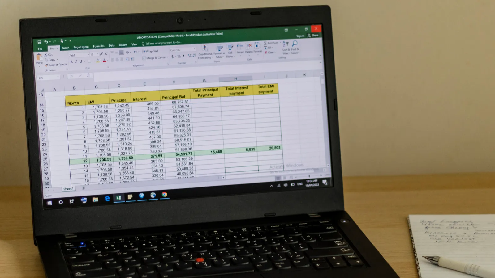 A shot of an Excel sheet on a laptop screen showing