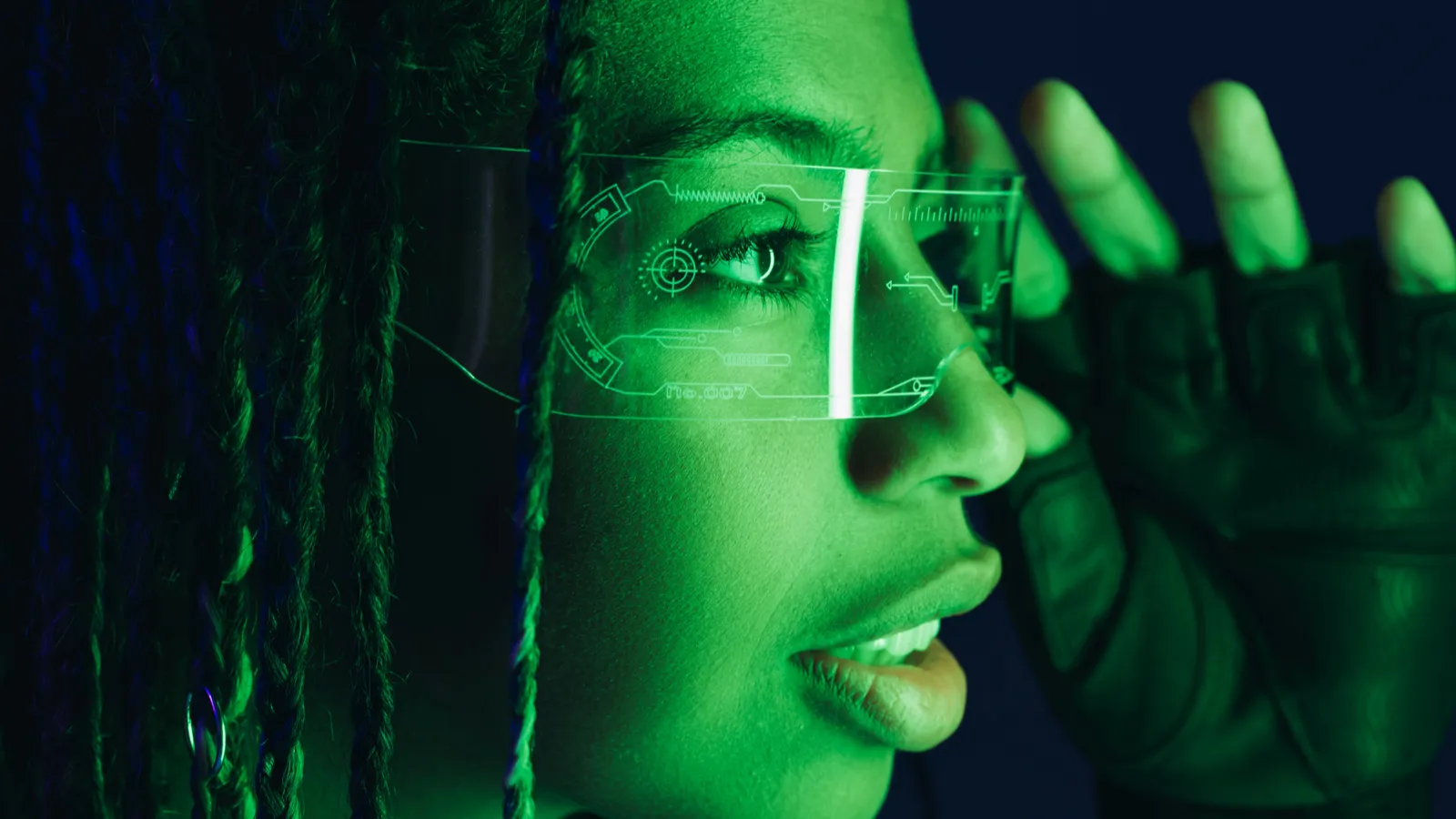 portrait of african american woman holding smart glasses isolated on